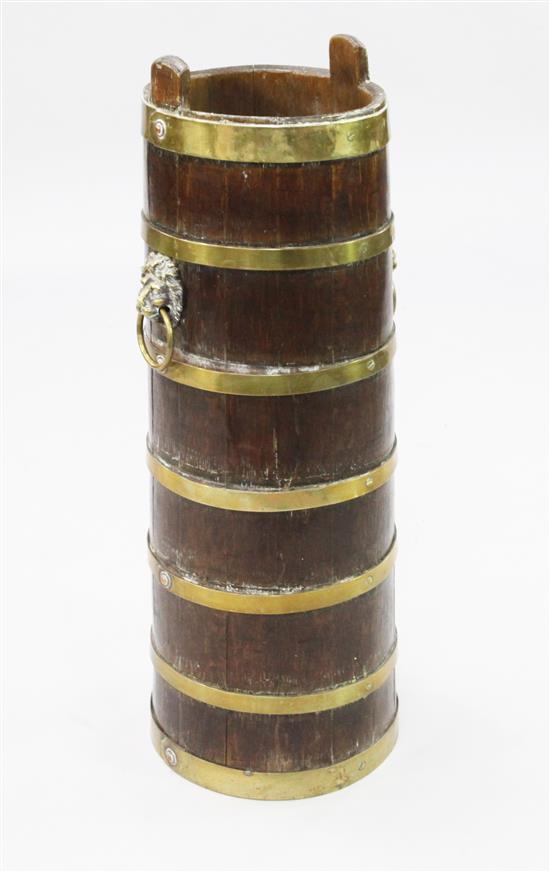 A tall oak barrelled stick stand, 28.5in.